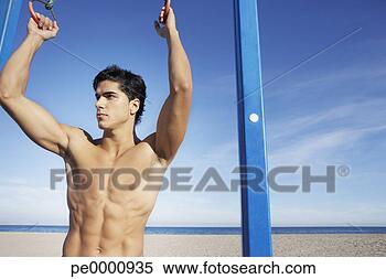 Banco de Imagem - homem,  praia, 
 trabalhando, 
 saída,  exercício, 
 anéis,  aparelho. 
fotosearch - busca 
de fotos, imagens 
e clipart