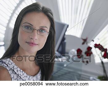 Stock Photo - businesswoman 
sitting in modern 
office. fotosearch 
- search stock 
photos, pictures, 
images, and photo 
clipart