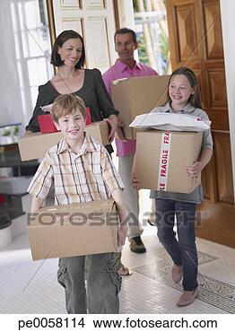 Stock Photo - couple with young 
boy and girl carrying 
boxes into home. 
fotosearch - search 
stock photos, 
pictures, images, 
and photo clipart