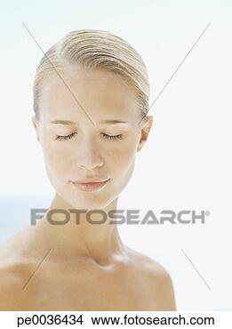 Stock Photo - woman looking 
serene. fotosearch 
- search stock 
photos, pictures, 
images, and photo 
clipart
