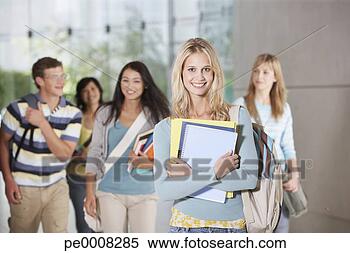 Banco de Imagem - jovem,  mulher, 
 escola,  escola, 
 livros. fotosearch 
- busca de fotos, 
imagens e clipart