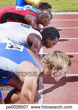 Picture - racers at start 
line on track. 
fotosearch - search 
stock photos, 
pictures, images, 
and photo clipart