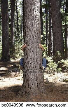 Stock Photo - a man hugging 
a tree. fotosearch 
- search stock 
photos, pictures, 
images, and photo 
clipart