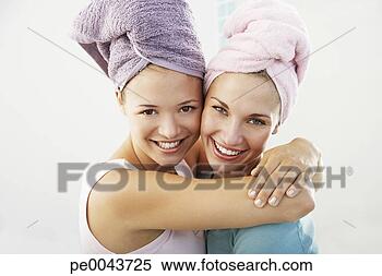 Stock Image - two girlfriends 
in a bathroom 
together. fotosearch 
- search stock 
photos, pictures, 
images, and photo 
clipart