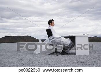 Stock Photography - man outdoors ensnared 
in a sheer sheet. 
fotosearch - search 
stock photos, 
pictures, images, 
and photo clipart