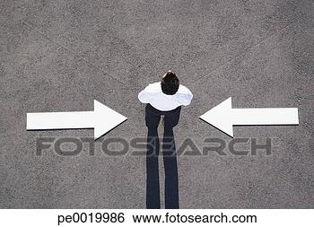 Stock Photo - arrows on pavement 
pointing to man. 
fotosearch - search 
stock photos, 
pictures, images, 
and photo clipart