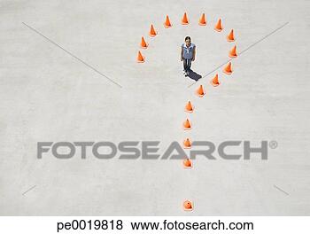 Stock Photo - traffic cones 
forming question 
mark with woman 
inside. fotosearch 
- search stock 
photos, pictures, 
images, and photo 
clipart
