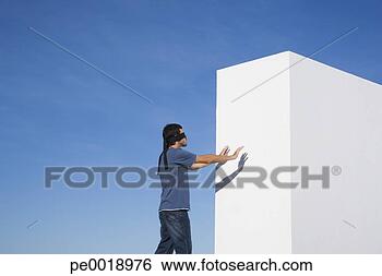 Stock Photo - blindfolded man 
reaching wall 
outdoors. fotosearch 
- search stock 
photos, pictures, 
images, and photo 
clipart