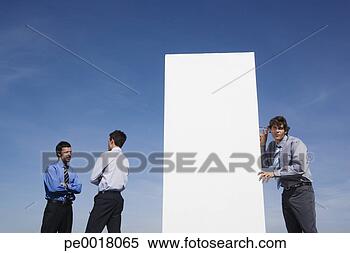 Stock Image - businessmen beside 
wall outdoors 
with man on other 
side listening. 
fotosearch - search 
stock photos, 
pictures, images, 
and photo clipart