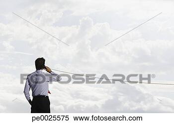 Stock Image - man outdoors with 
telephone receiver. 
fotosearch - search 
stock photos, 
pictures, images, 
and photo clipart