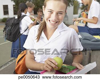 Stock Photo - students outside 
their school eating. 
fotosearch - search 
stock photos, 
pictures, images, 
and photo clipart