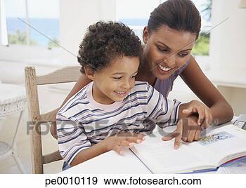 Stock Photograph - mother and son 
reading. fotosearch 
- search stock 
photos, pictures, 
images, and photo 
clipart