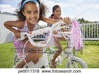 two-girls-riding_~pe0011318.jpg