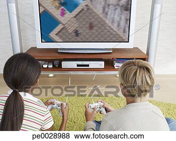 Banco de Imagem - dois,  jovem, 
 crianças,  tocando, 
 vídeo,  jogos. 
fotosearch - busca 
de fotos, imagens 
e clipart