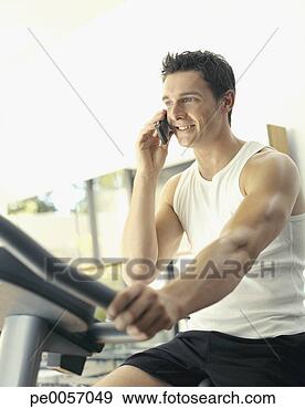 Stock Photograph - a man working 
out. fotosearch 
- search stock 
photos, pictures, 
images, and photo 
clipart