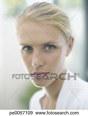 Stock Photograph - a stoic woman. 
fotosearch - search 
stock photos, 
pictures, images, 
and photo clipart