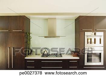 Stock Photo - interior shot 
of a modern kitchen. 
fotosearch - search 
stock photos, 
pictures, images, 
and photo clipart