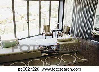 Stock Photography - modern living 
room with large 
windows. fotosearch 
- search stock 
photos, pictures, 
images, and photo 
clipart