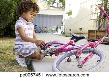 Stock Photography - girl sitting with 
bicycle in driveway. 
fotosearch - search 
stock photos, 
pictures, images, 
and photo clipart