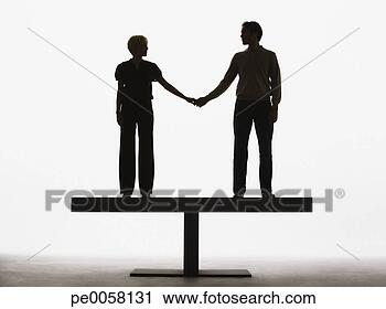 Stock Photography - couple standing 
on a plank holding 
hands. fotosearch 
- search stock 
photos, pictures, 
images, and photo 
clipart