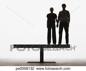 Stock Photo - couple standing 
on a plank holding 
hands. fotosearch 
- search stock 
photos, pictures, 
images, and photo 
clipart