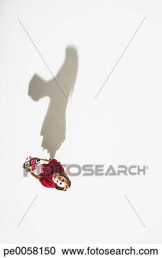 Stock Photography - girl holding a 
patterned box 
looking up. fotosearch 
- search stock 
photos, pictures, 
images, and photo 
clipart