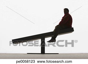 Stock Photo - large man on unbalanced 
plank. fotosearch 
- search stock 
photos, pictures, 
images, and photo 
clipart