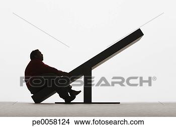 Stock Photo - large man on unbalanced 
plank. fotosearch 
- search stock 
photos, pictures, 
images, and photo 
clipart