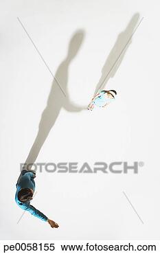 Stock Image - man with girl 
where shadow looks 
like he's holding 
her up in air. 
fotosearch - search 
stock photos, 
pictures, images, 
and photo clipart