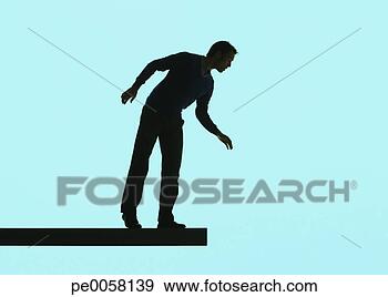 Stock Photograph - man standing on 
a plank looking 
over ledge. fotosearch 
- search stock 
photos, pictures, 
images, and photo 
clipart