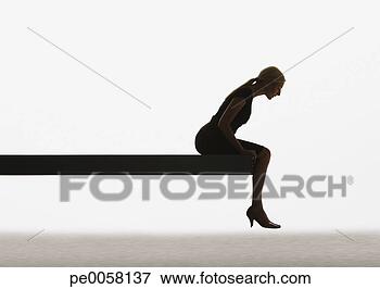 Picture - woman sitting 
on a plank looking 
over ledge. fotosearch 
- search stock 
photos, pictures, 
images, and photo 
clipart