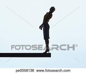 Stock Photo - woman standing 
on a plank looking 
over ledge. fotosearch 
- search stock 
photos, pictures, 
images, and photo 
clipart