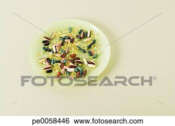 Stock Photo - a plate with pills 
on it. fotosearch 
- search stock 
photos, pictures, 
images, and photo 
clipart