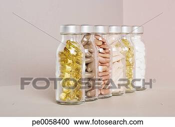 Stock Photography - six bottles of 
pills. fotosearch 
- search stock 
photos, pictures, 
images, and photo 
clipart