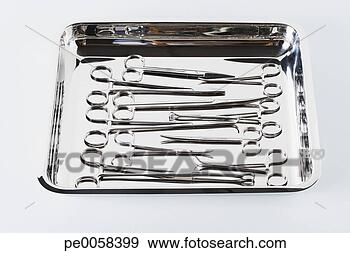 Stock Photograph - tray full of medical 
scissors and forceps. 
fotosearch - search 
stock photos, 
pictures, images, 
and photo clipart