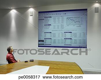Picture - businessman watching 
presentation on 
projection screen. 
fotosearch - search 
stock photos, 
pictures, images, 
and photo clipart