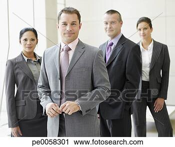 Stock Photography - four businesspeople 
in office smiling. 
fotosearch - search 
stock photos, 
pictures, images, 
and photo clipart