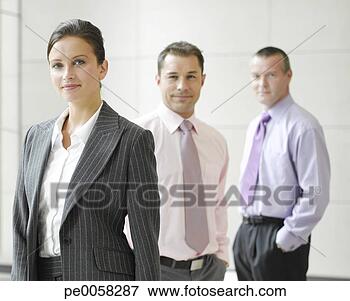 Picture - three businesspeople 
in an office. 
fotosearch - search 
stock photos, 
pictures, images, 
and photo clipart