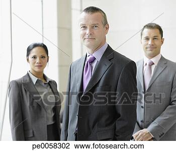Stock Photo - three businesspeople 
in office smiling. 
fotosearch - search 
stock photos, 
pictures, images, 
and photo clipart