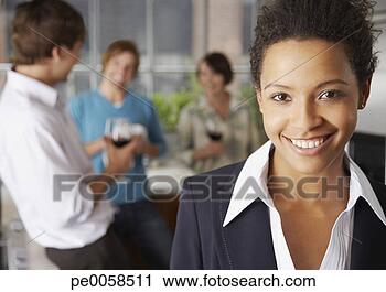 Stock Photography - four people in 
kitchen with wine. 
fotosearch - search 
stock photos, 
pictures, images, 
and photo clipart