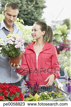 Stock Photo - man and girl shopping 
for flowers. fotosearch 
- search stock 
photos, pictures, 
images, and photo 
clipart