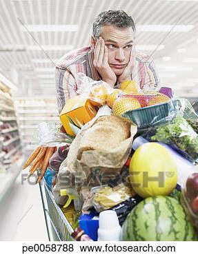 Stock Photo - man grocery shopping. 
fotosearch - search 
stock photos, 
pictures, images, 
and photo clipart