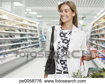 Stock Photo - woman grocery 
shopping. fotosearch 
- search stock 
photos, pictures, 
images, and photo 
clipart
