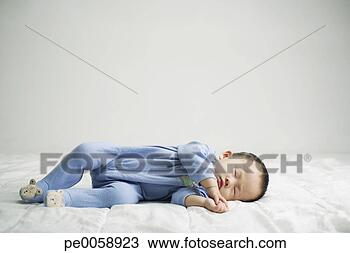 Stock Photo - baby sleeping. 
fotosearch - search 
stock photos, 
pictures, images, 
and photo clipart