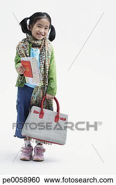 Stock Photography - girl holding large 
handbag. fotosearch 
- search stock 
photos, pictures, 
images, and photo 
clipart