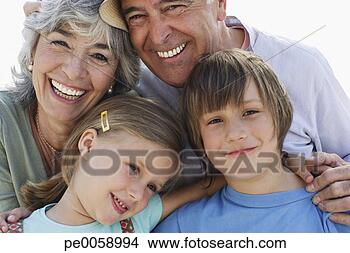 Stock Photo - couple with young 
boy and girl outdoors. 
fotosearch - search 
stock photos, 
pictures, images, 
and photo clipart