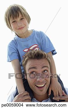 Stock Photo - man with boy on 
shoulders. fotosearch 
- search stock 
photos, pictures, 
images, and photo 
clipart