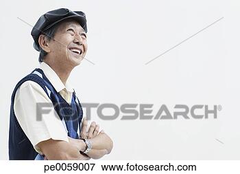 Picture - man wearing hat 
smiling. fotosearch 
- search stock 
photos, pictures, 
images, and photo 
clipart