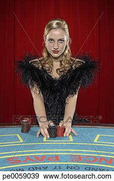 Stock Photograph - woman with betting 
chips on casino 
table. fotosearch 
- search stock 
photos, pictures, 
images, and photo 
clipart
