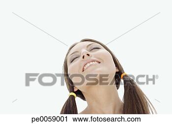 Stock Photography - woman with eyes 
closed and head 
tilted back. fotosearch 
- search stock 
photos, pictures, 
images, and photo 
clipart